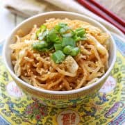 Shirataki sesame noodles are served with chopsticks.