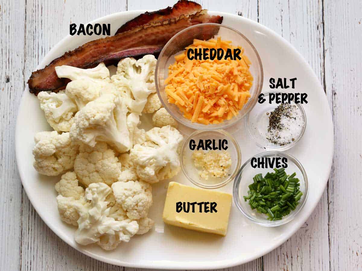 The ingredients needed to make loaded mashed cauliflower. 