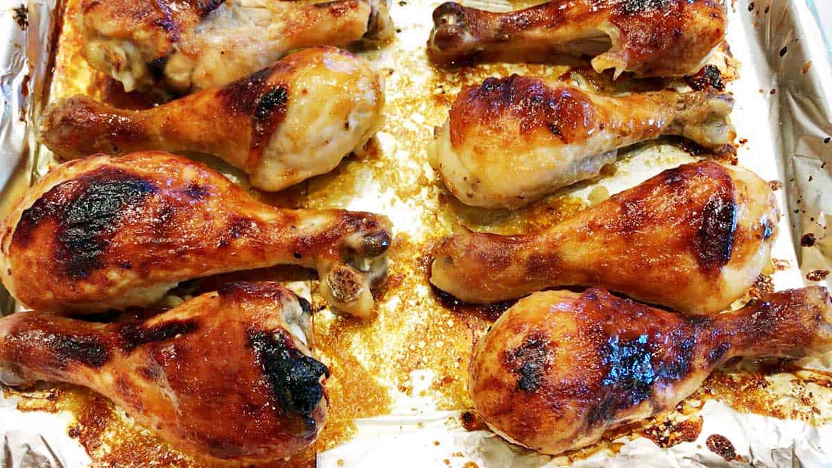 Chicken is ready in the baking sheet. 