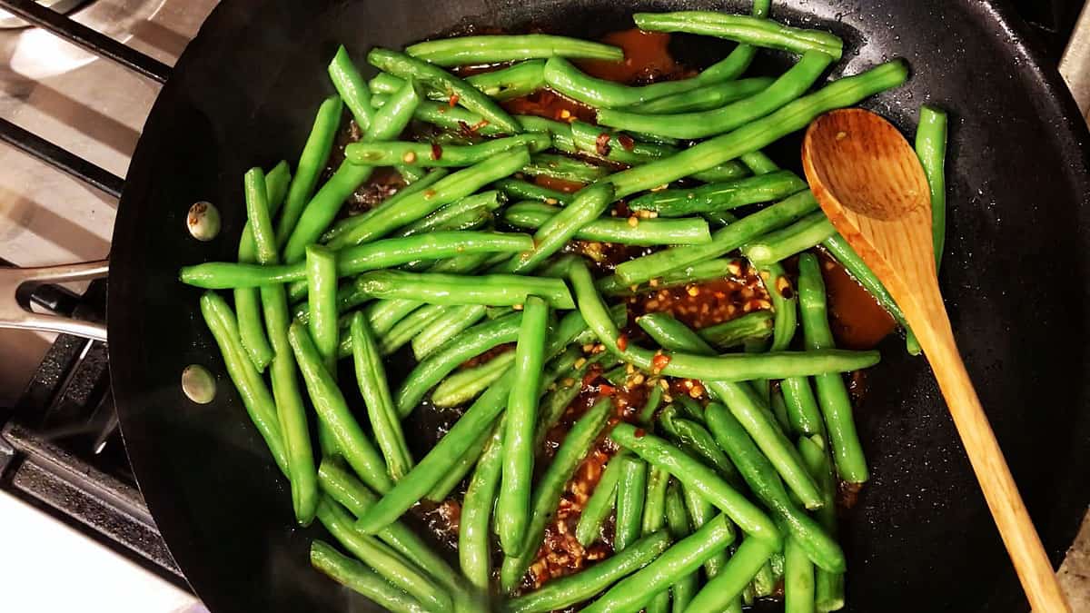 Add the sauce to the skillet. 