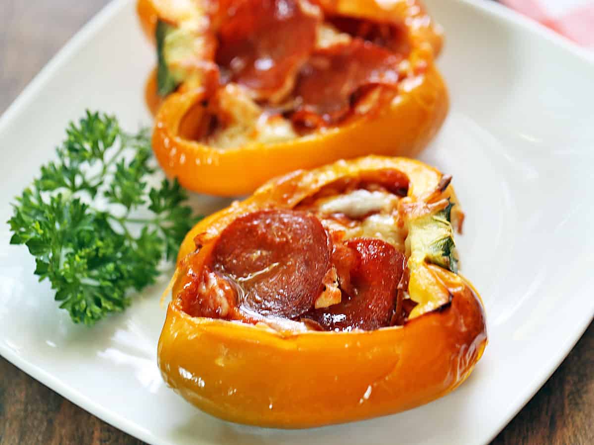 Bell pepper pizza lunch served on a white plate. 