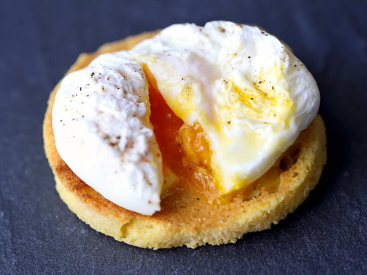 A poached egg served on a toasted English muffin. 
