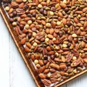 Roasted nuts on a baking sheet.