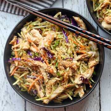 Chinese chicken salad is served with chopsticks.