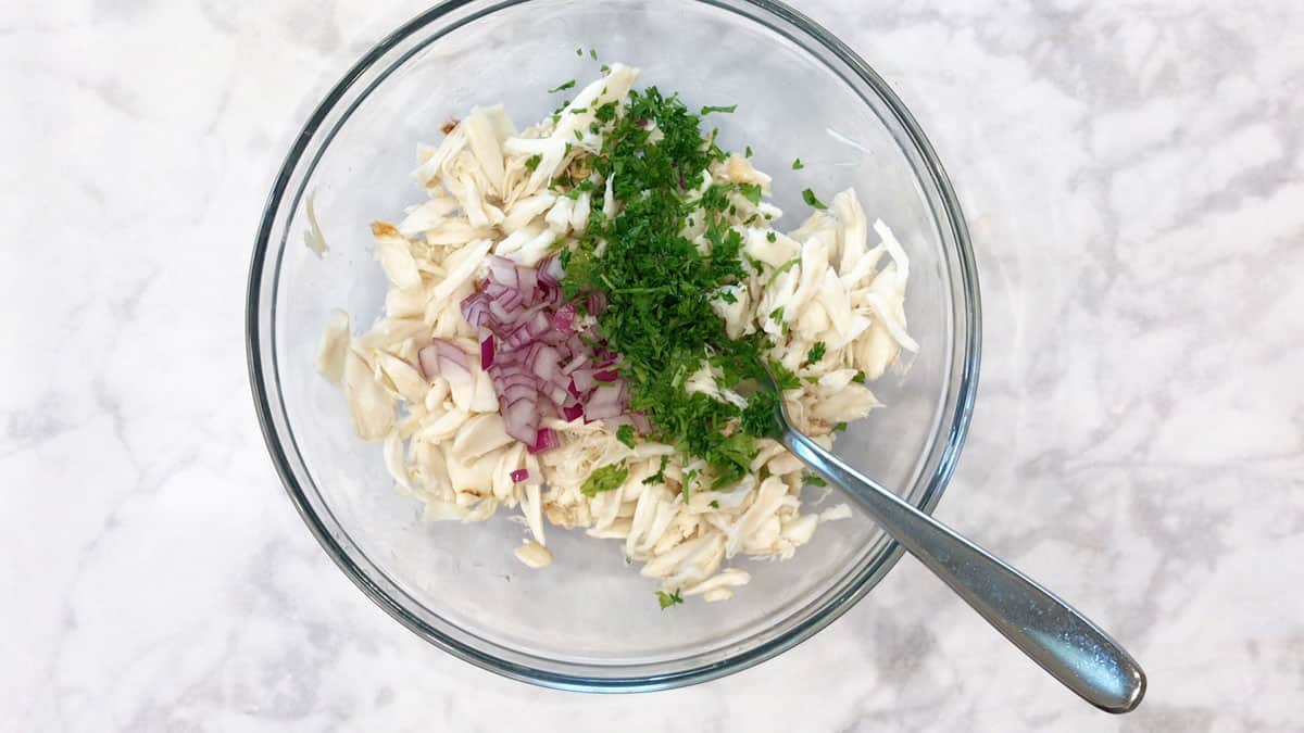 Crab salad ingredients in a bowl. 
