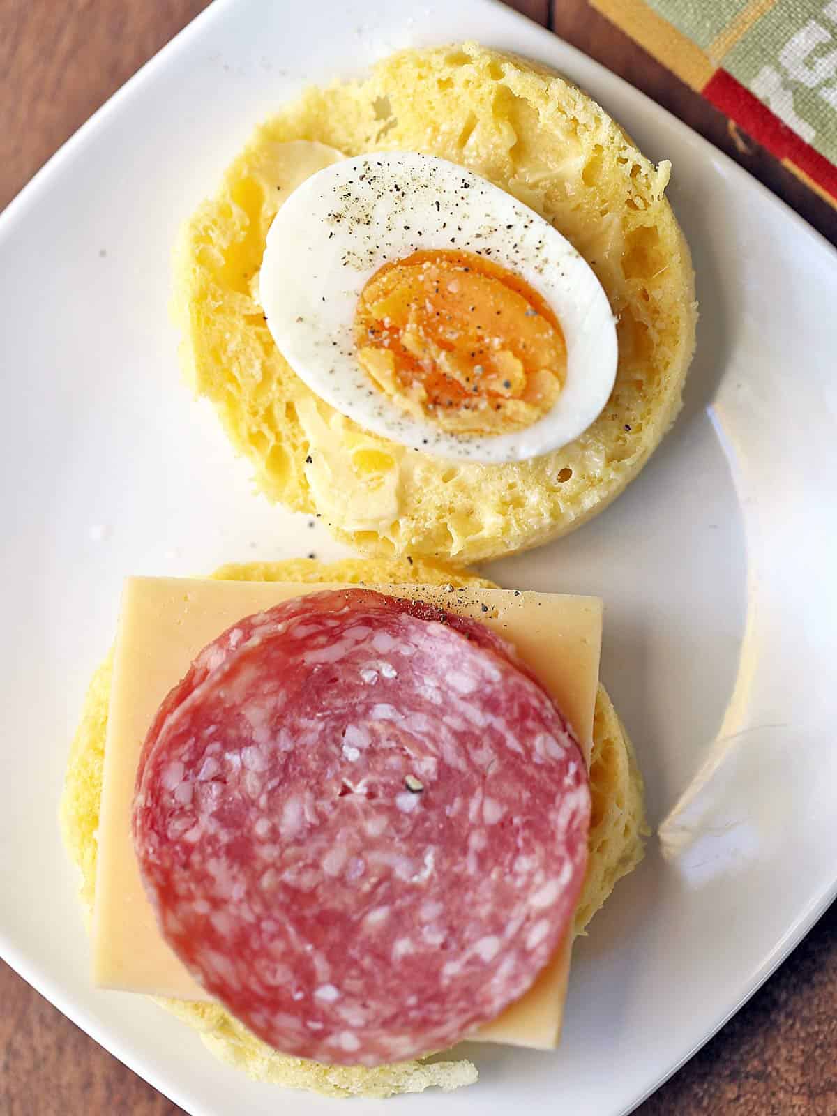 90-second bread is topped with eggs, salami, and cheese. 