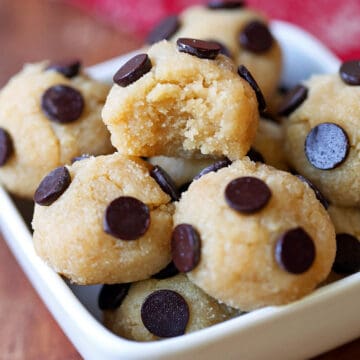 Keto cookie dough is served in a white bowl.