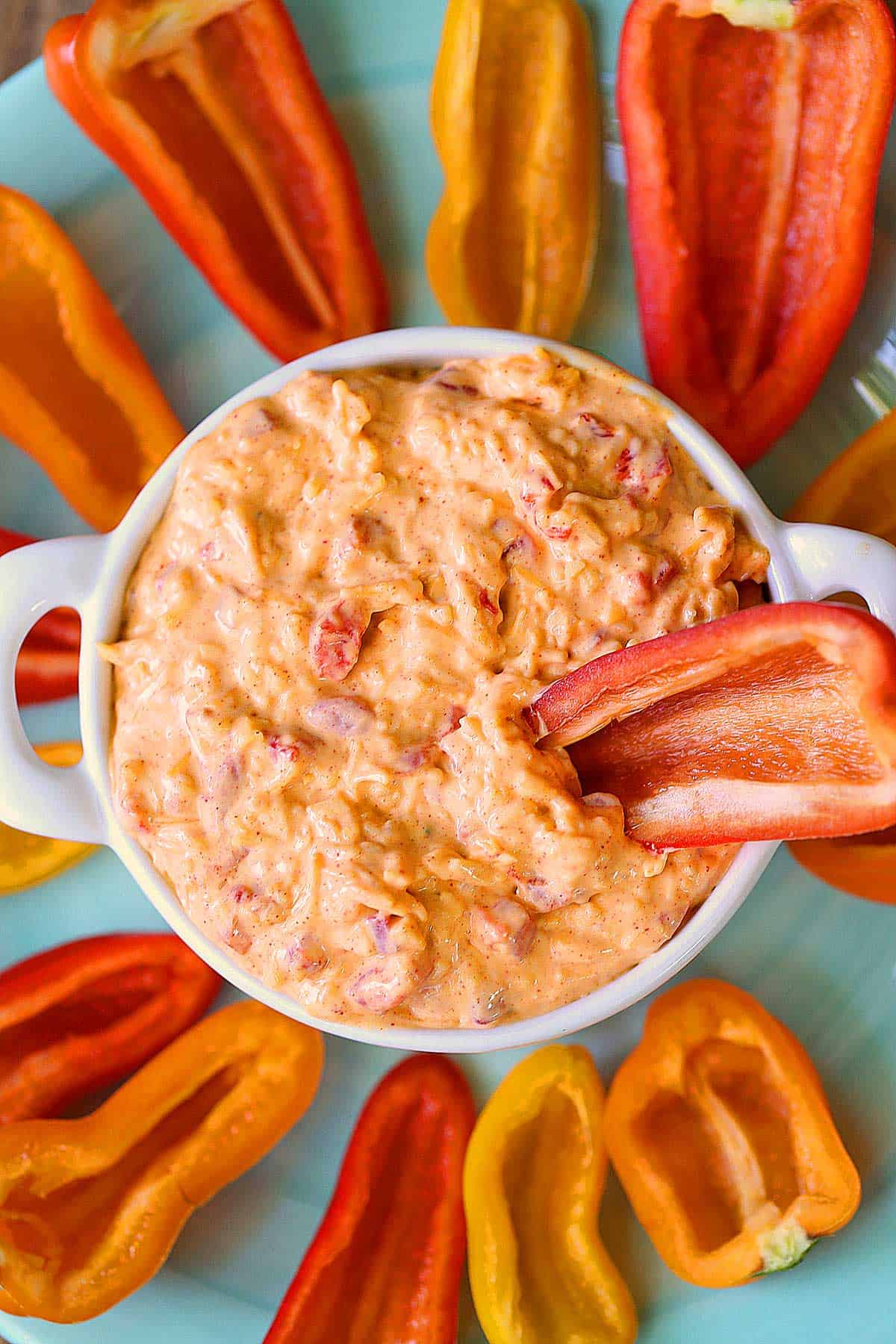 Homemade pimento cheese served with fresh vegetables for dipping.