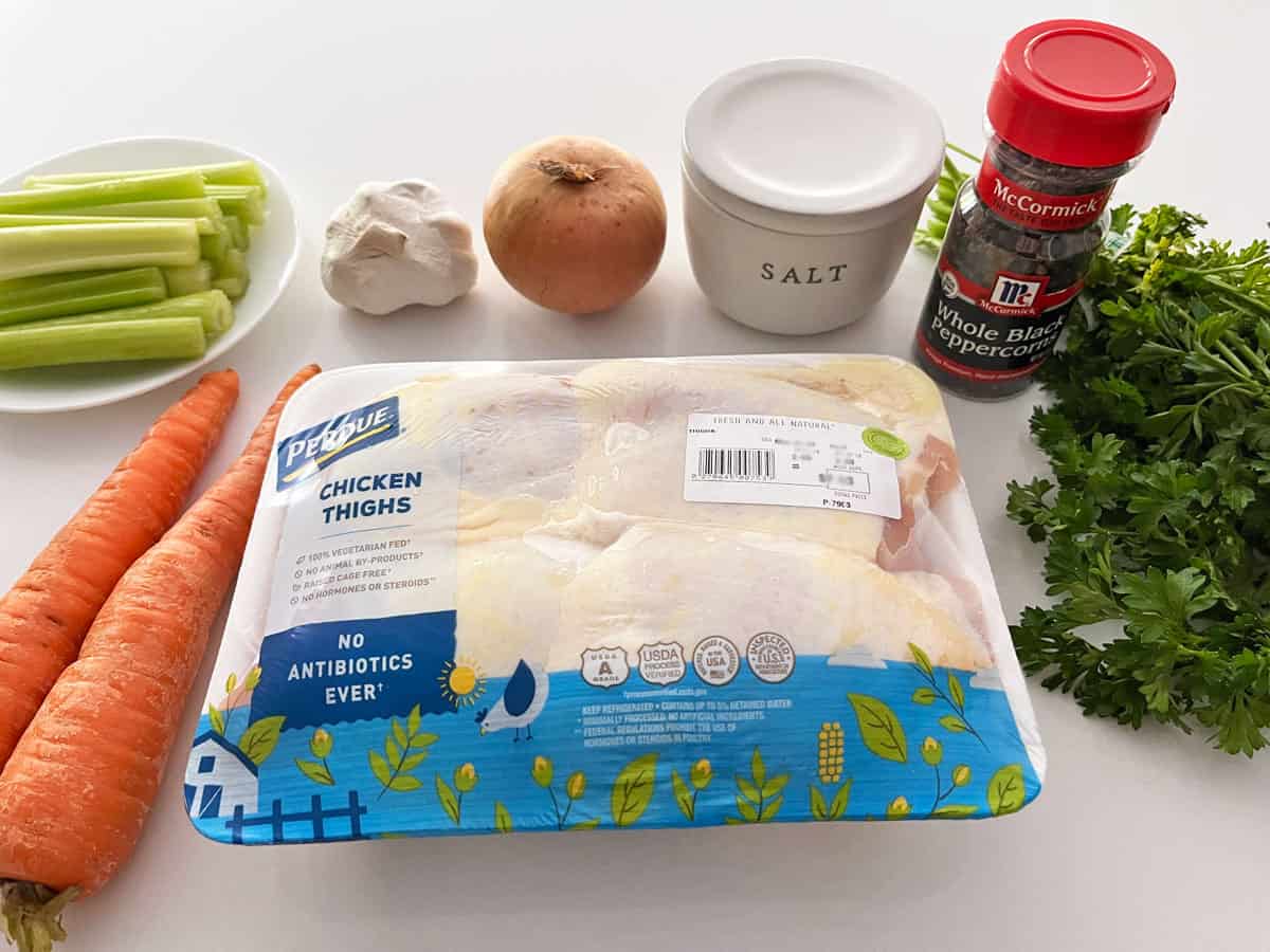 The ingredients needed to make homemade chicken broth. 