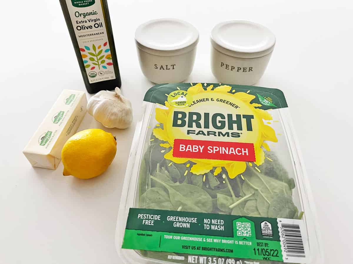 The ingredients needed to saute spinach. 