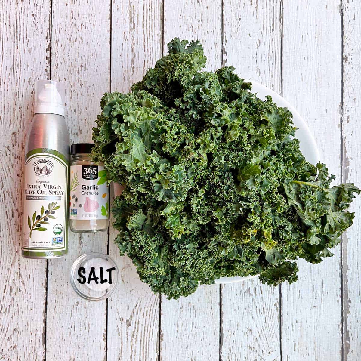 The ingredients needed to bake kale chips. 