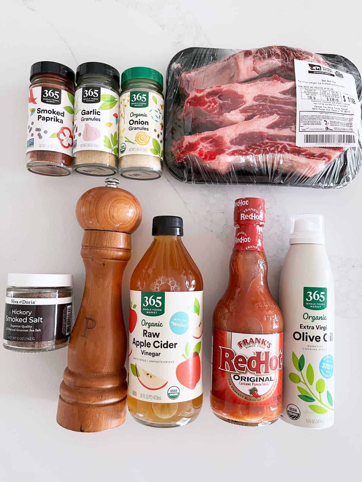 The ingredients needed to cook beef back ribs in the oven. 