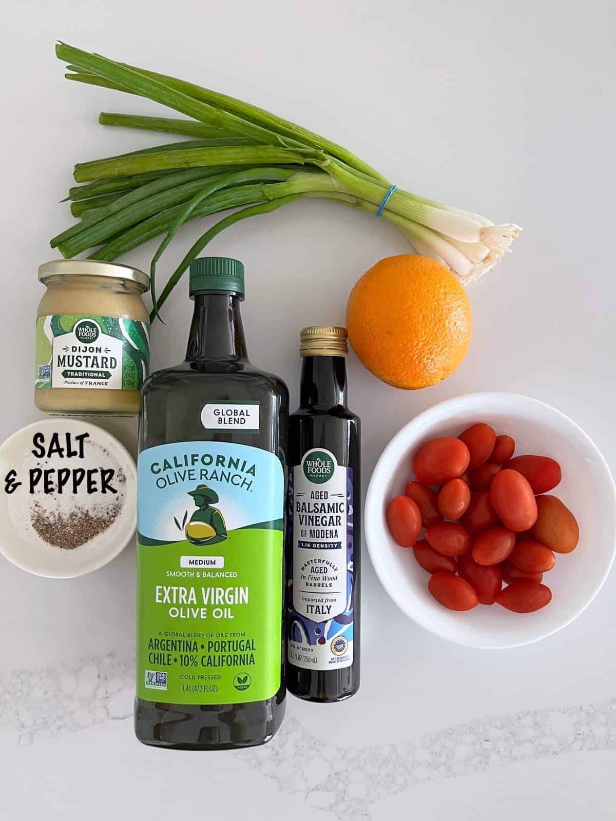 The ingredients needed to make a tomato salad. 