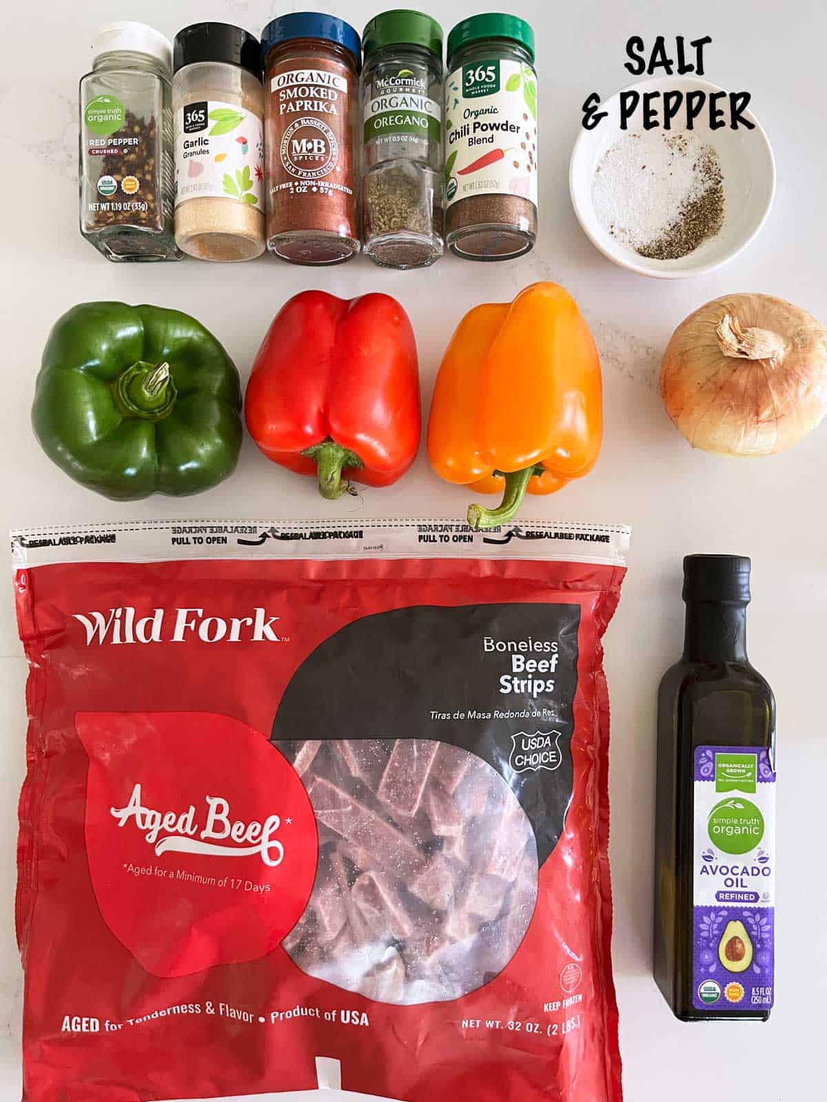 The ingredients needed to make steak fajitas. 