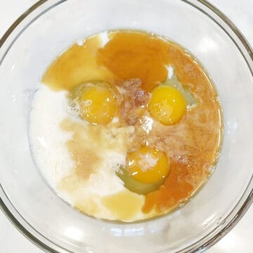 Mixing the wet ingredients in a bowl.