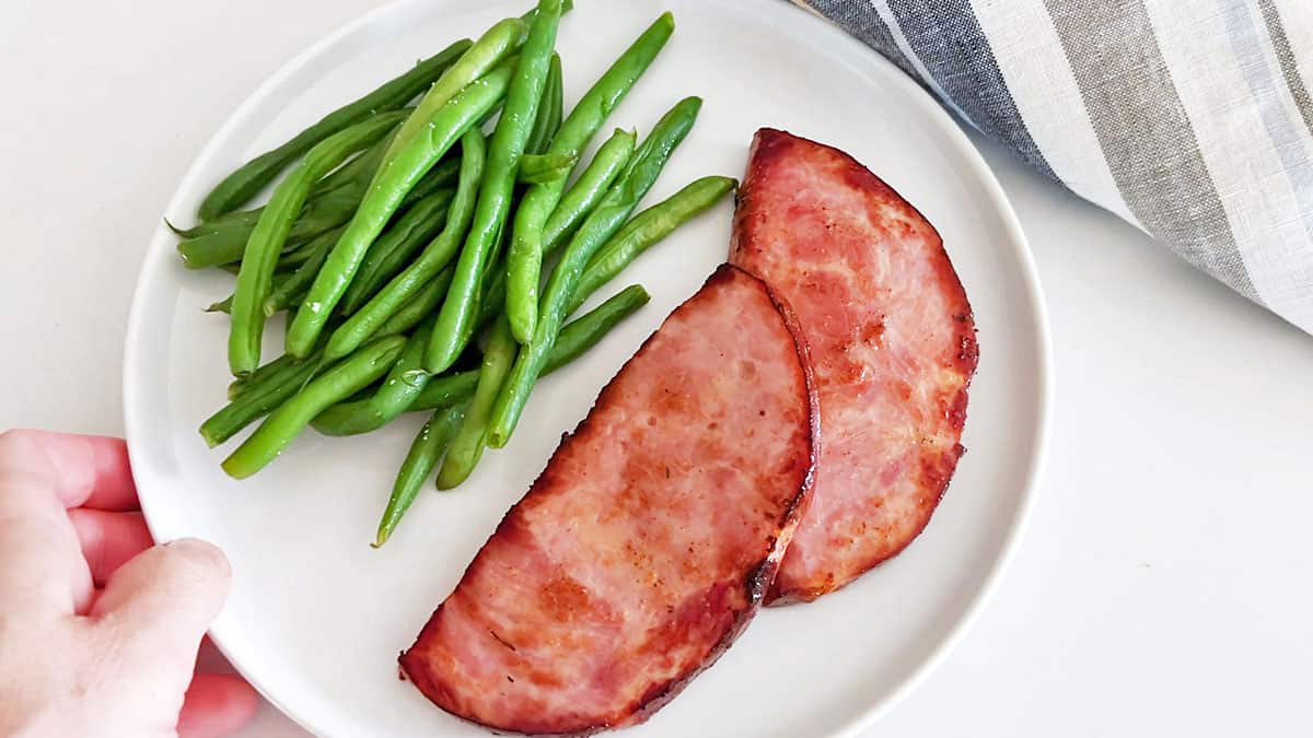 Serving ham steak. 