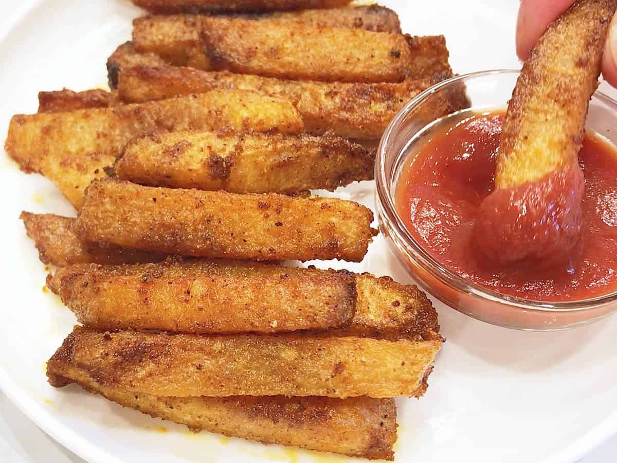 Jicama fries served with ketchup. 