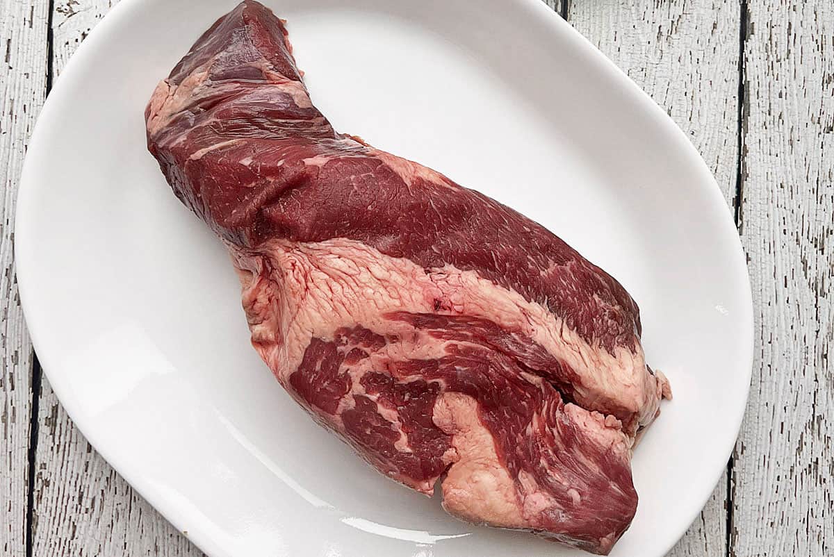 Brisket point on a white plate. 