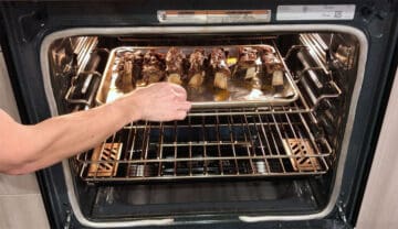 Broiling the ribs.