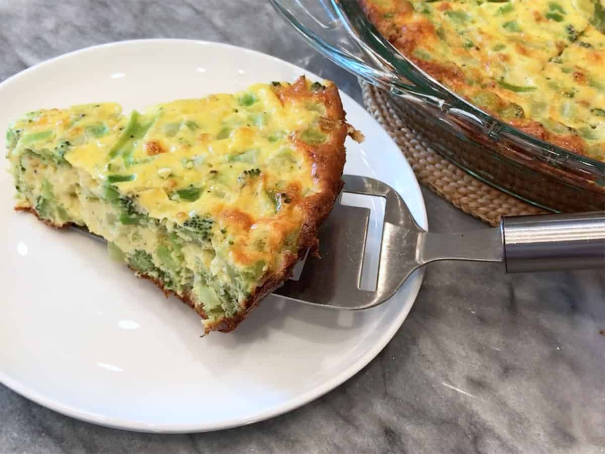 Serving the quiche.