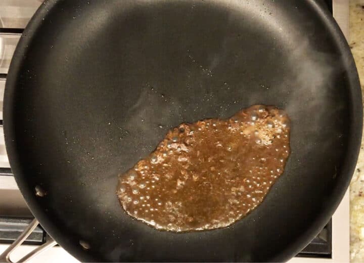 Brandy reduced in the skillet.