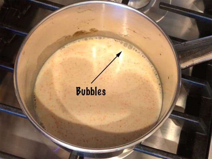 The mixture bubbles around the edges.
