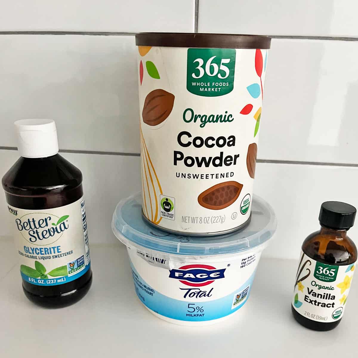 The ingredients needed to make chocolate frozen yogurt.