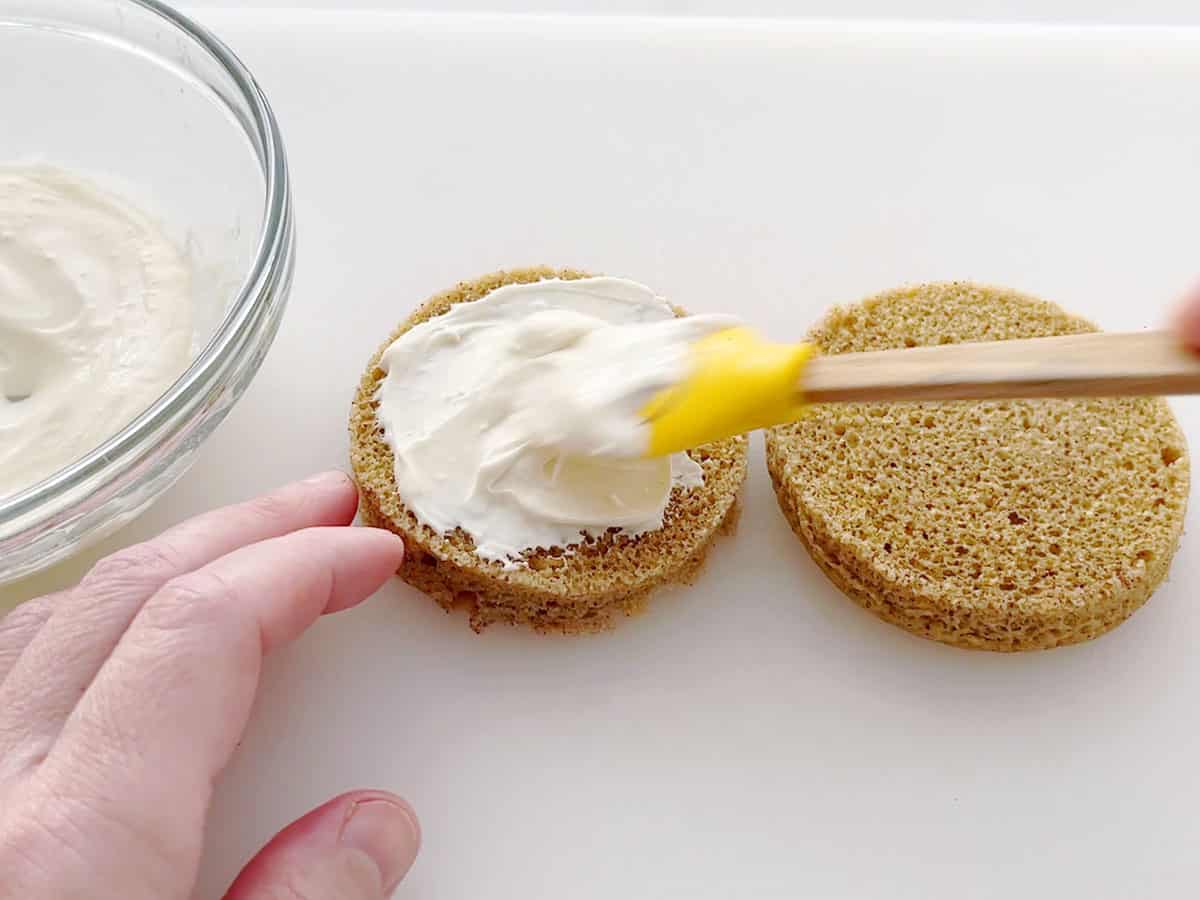 Frosting the cake.