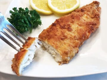 Serving the fish.