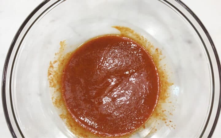 Mixing the buffalo sauce.
