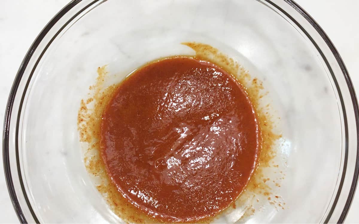 Mixing the buffalo sauce.