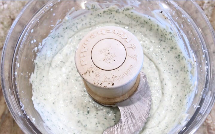 Mint yogurt sauce is ready in the food processor.