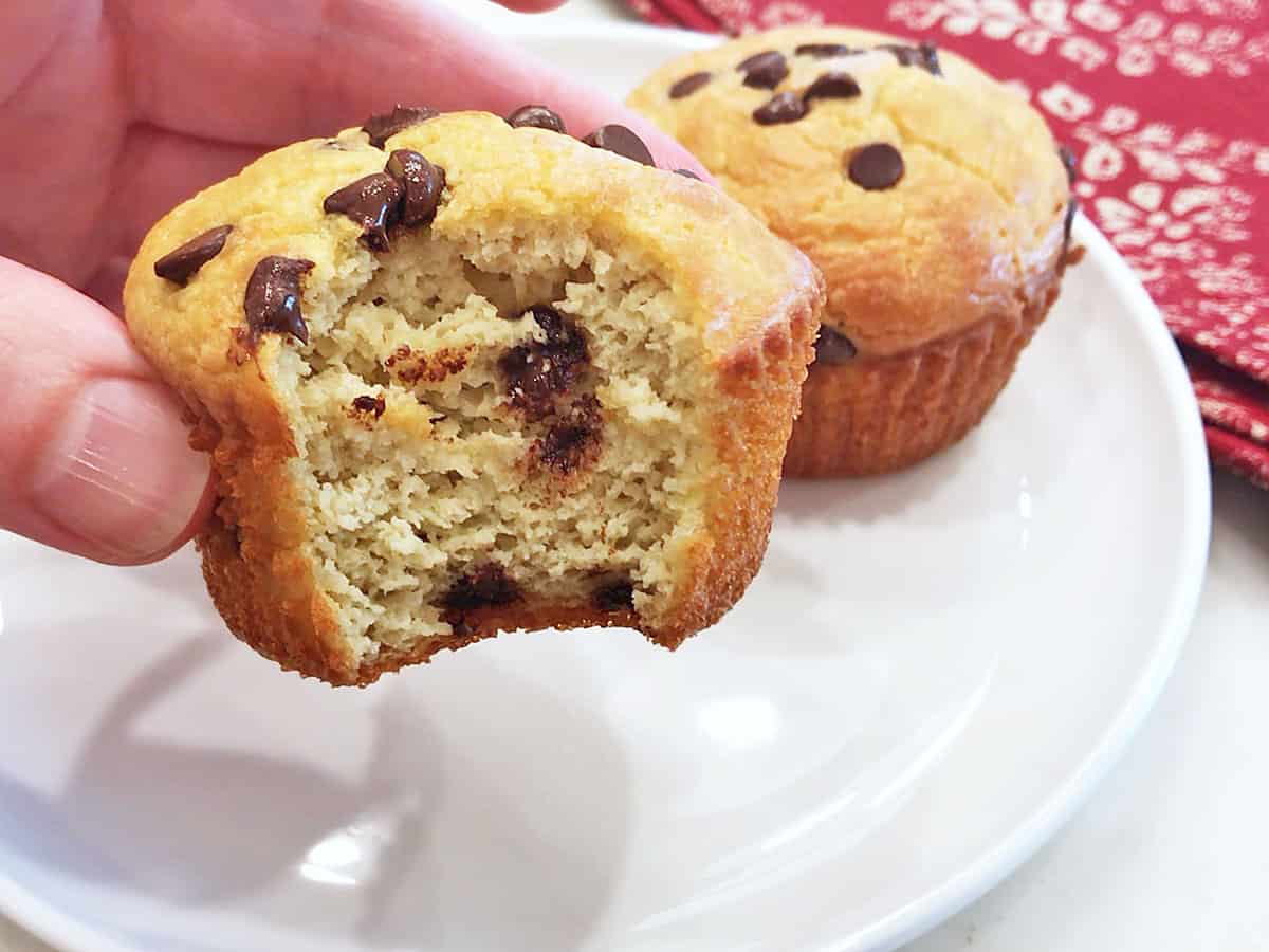 A bitten keto chocolate chip muffin.