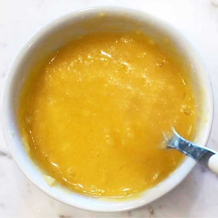 Mixing in the flour.