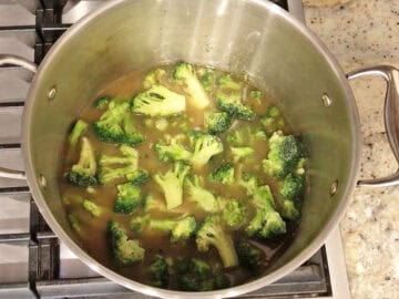 The broccoli florets were added to the stockpot.