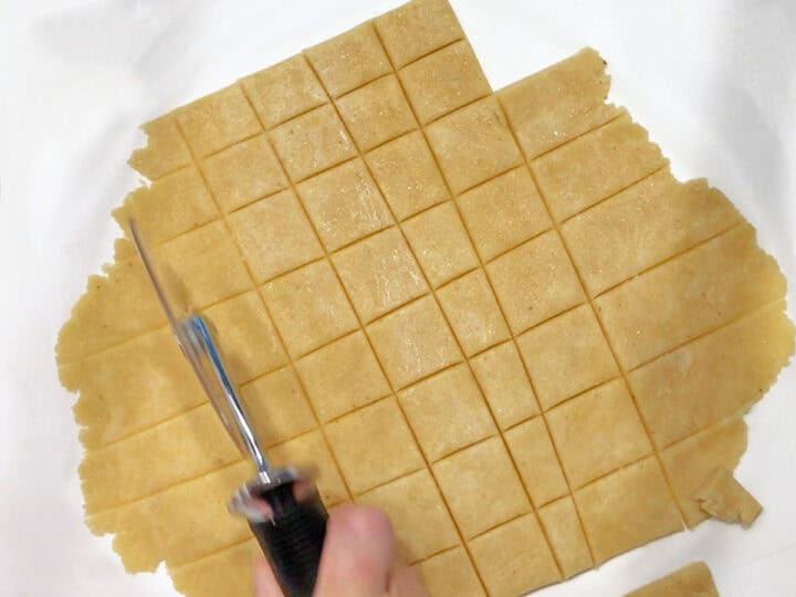 Cutting the dough.