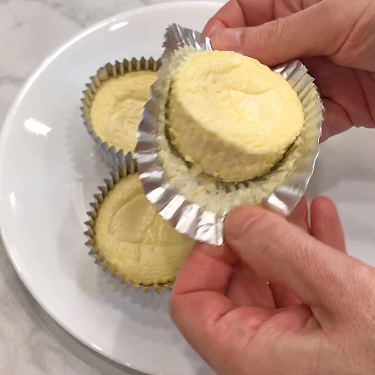 Demonstrating that foil liners are easy to remove.