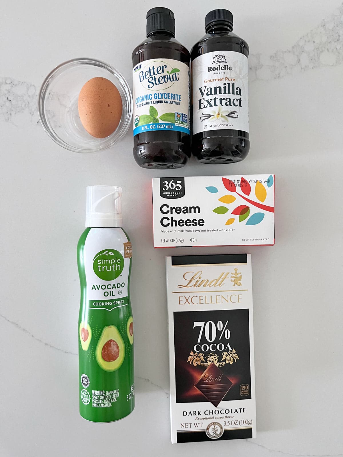 The ingredients needed for mini chocolate cheesecakes.