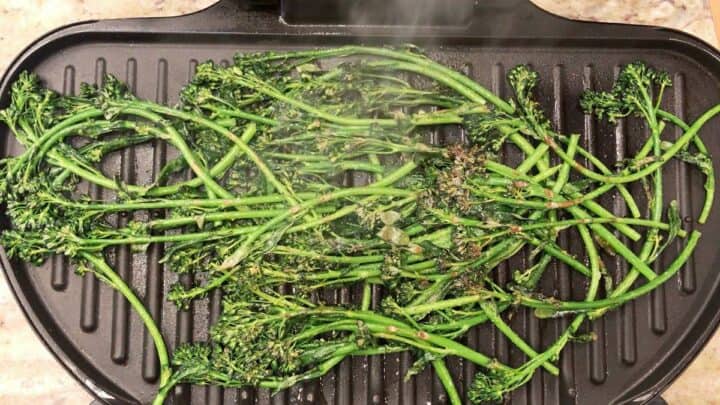 The broccolini is on the grill.