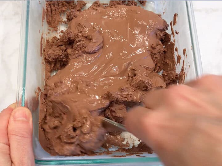 Stirring the yogurt.