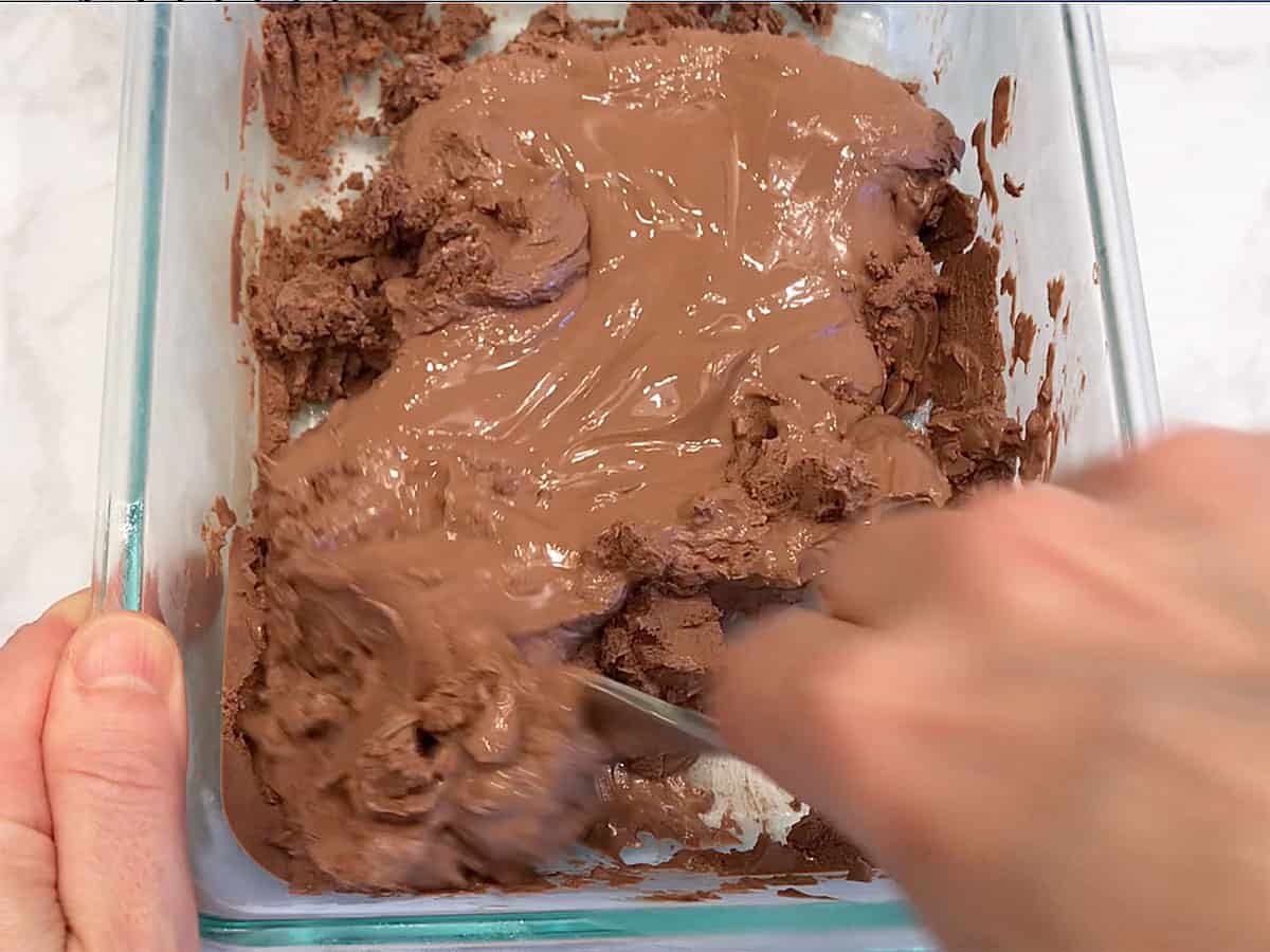 Stirring the yogurt.