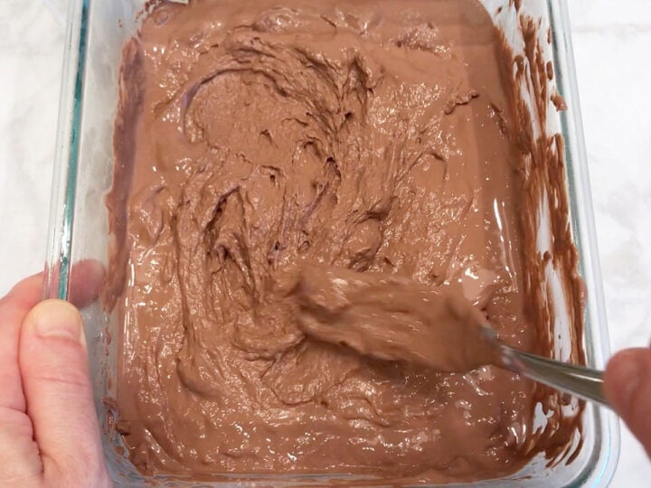 Stirring the yogurt again.