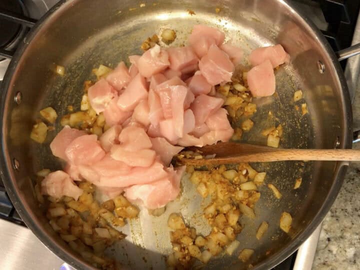 The chicken was added to the skillet.