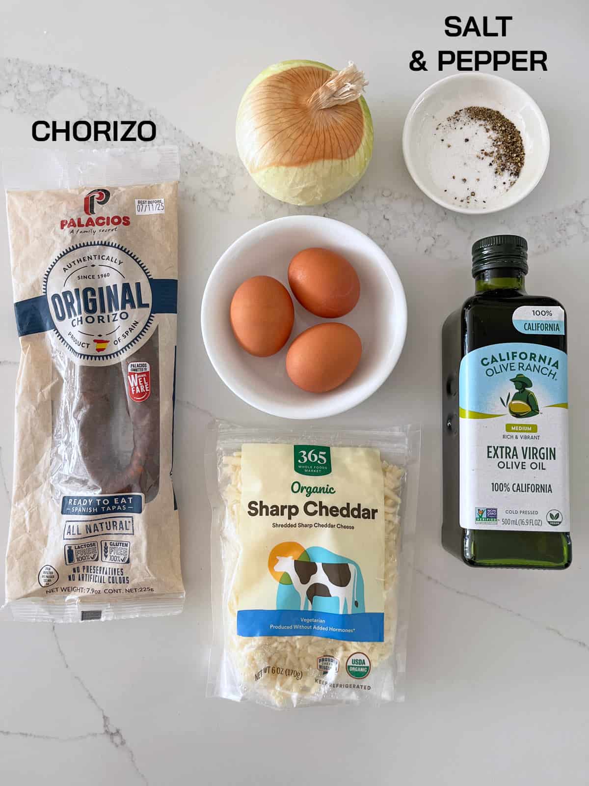 The ingredients needed to make a chorizo omelette.