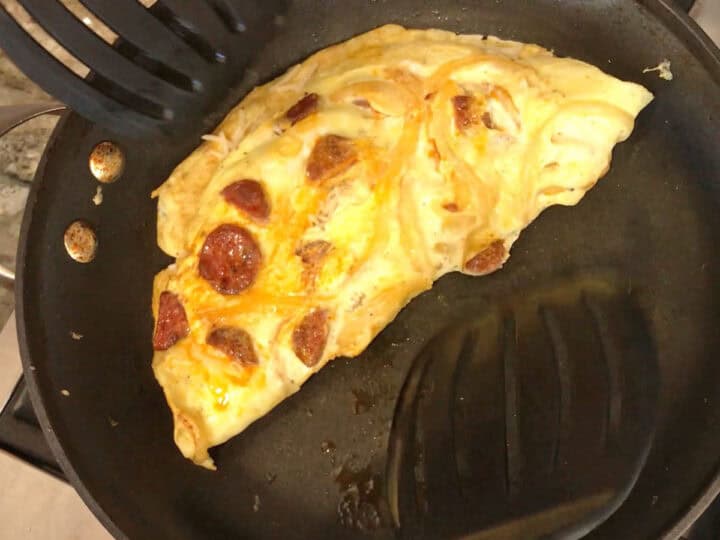 Folding the omelette.