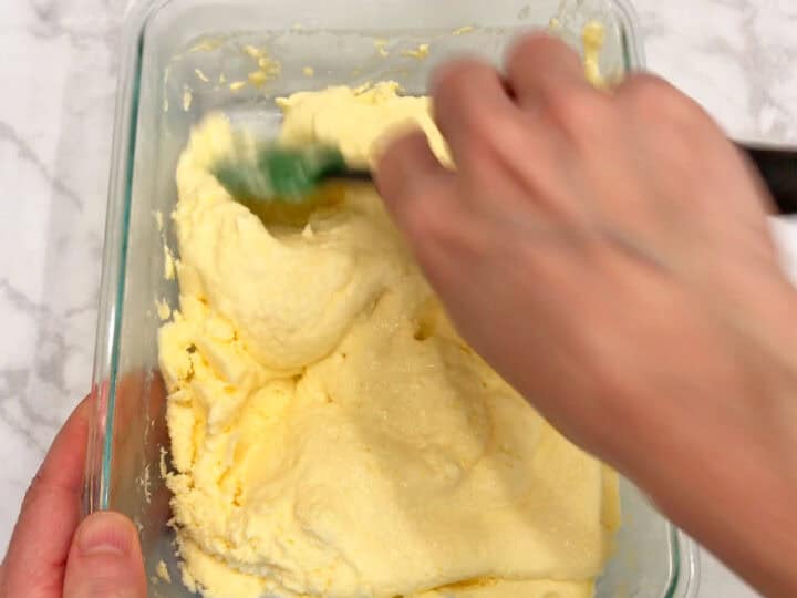 Stirring the yogurt.