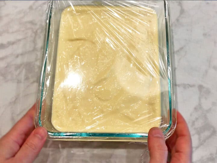 The yogurt mixture was transferred to a pan and covered with cling wrap.