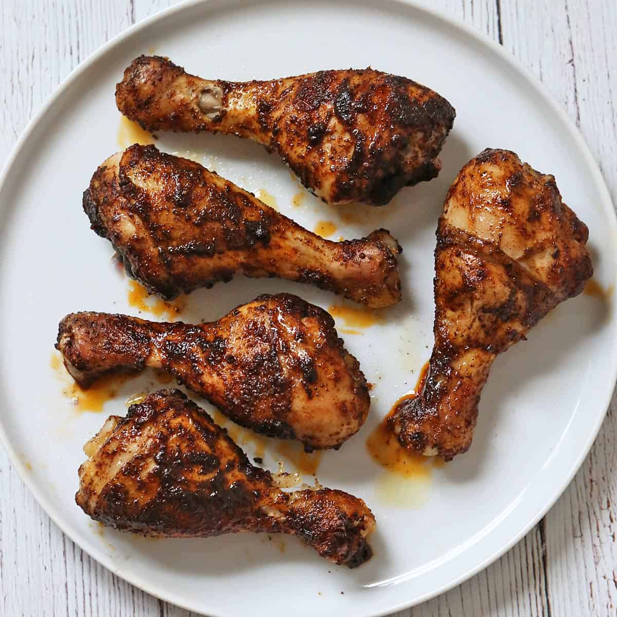 Baked chicken drumsticks that were seasoned with chili powder.